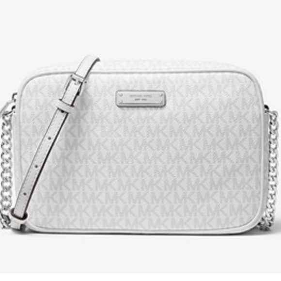 Michael Kors Handbags - White Michael kors crossbody purse logo